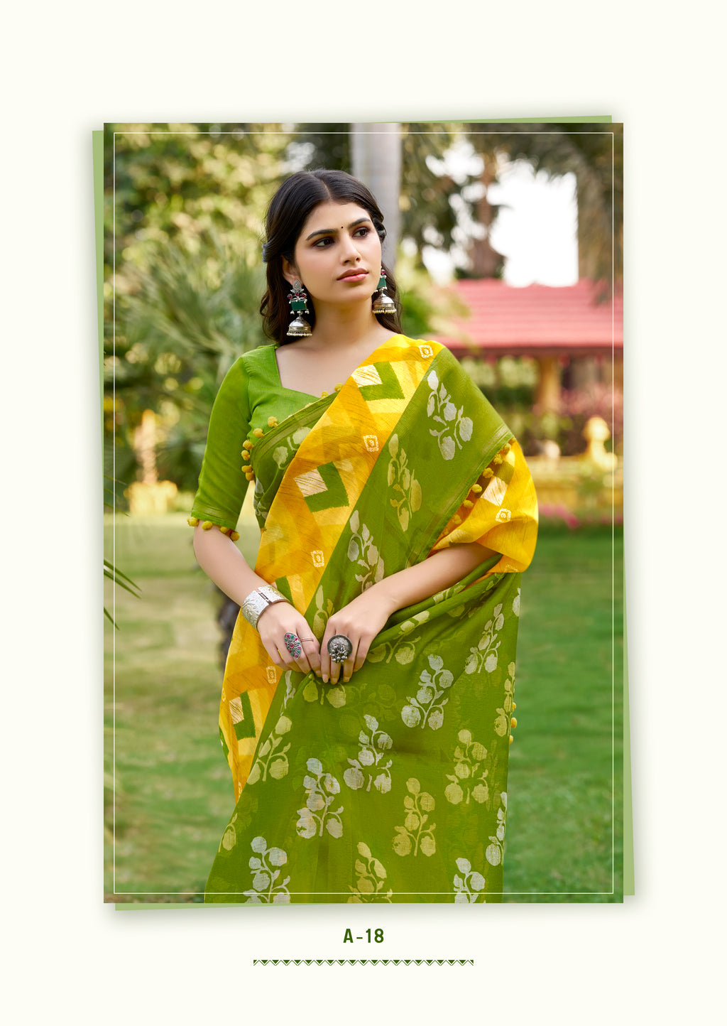 Tara Green Mul Mul Cotton Saree | Ikkat Border & Pom Pom Accents