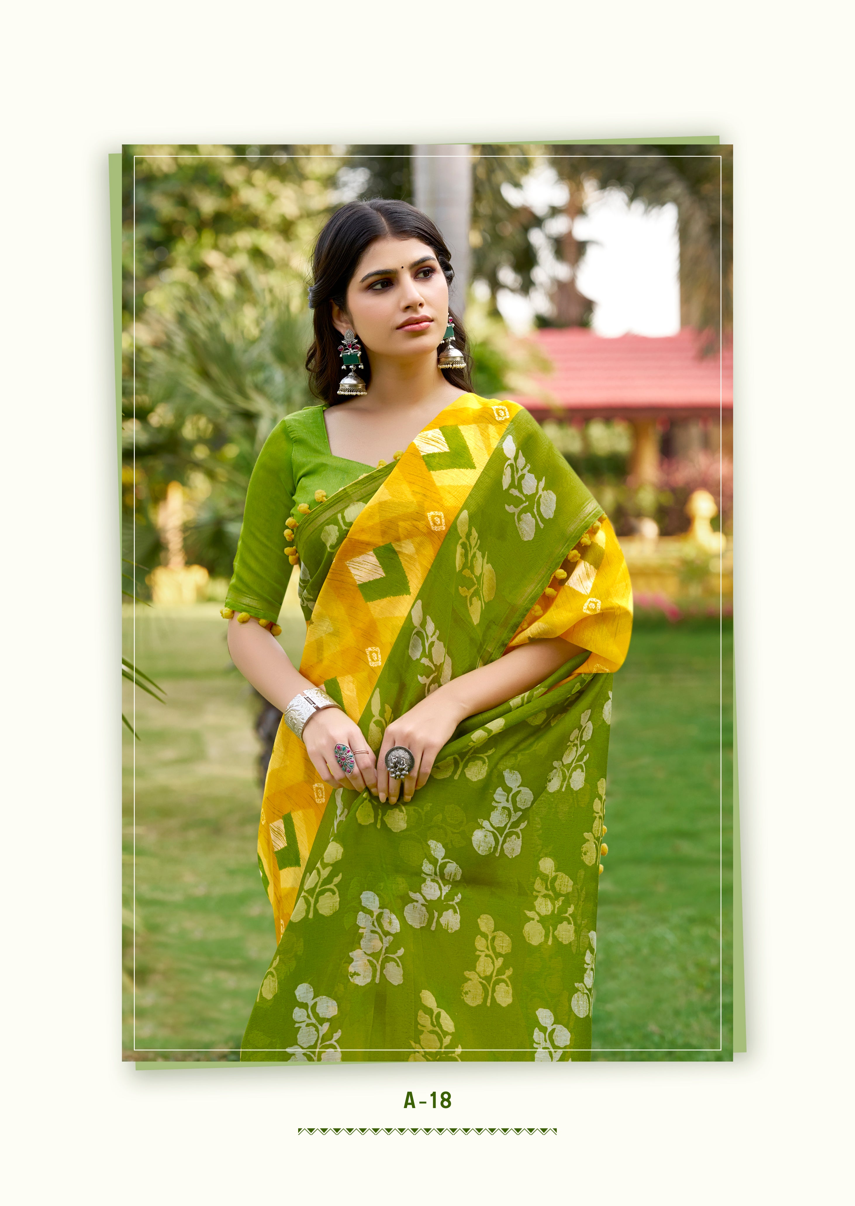 Tara Green Mul Mul Cotton Saree | Ikkat Border & Pom Pom Accents